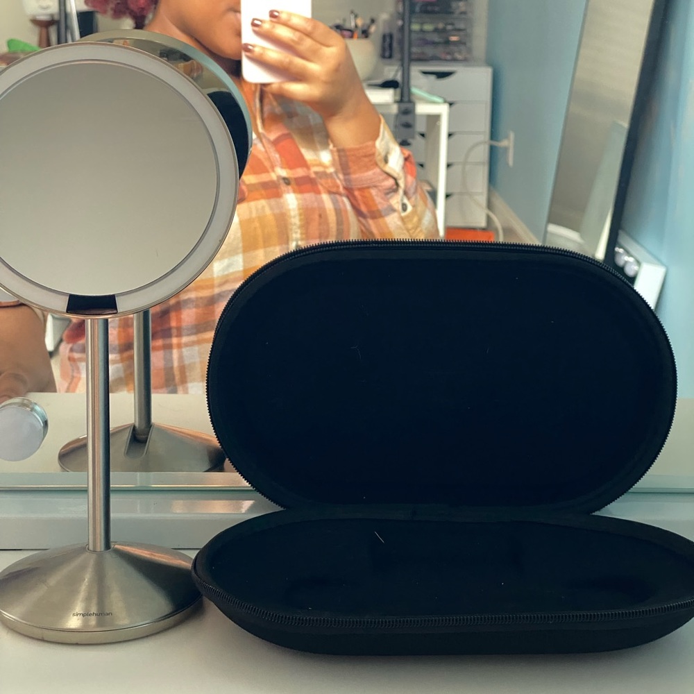 Simple Human Mirror with Stand + USB cord included.